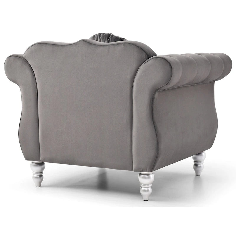 Fauteuil d'appoint en velours capitonné Chesterfield avec accoudoirs évasés et coussin décoratif