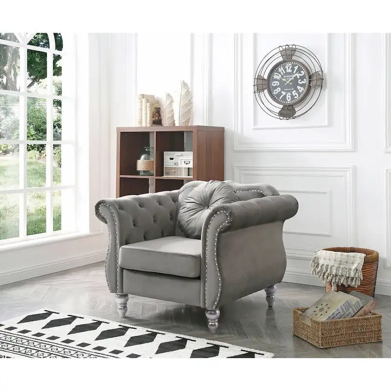 Fauteuil d'appoint en velours capitonné Chesterfield avec accoudoirs évasés et coussin décoratif