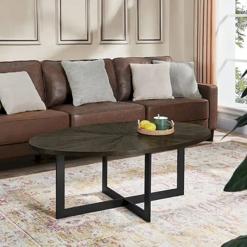 Table basse ovale en frêne avec piètement croisé en fer et étagère à 2 niveaux