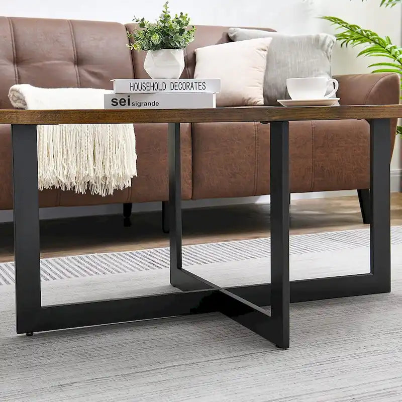 Table basse ovale en frêne avec piètement croisé en fer et étagère à 2 niveaux