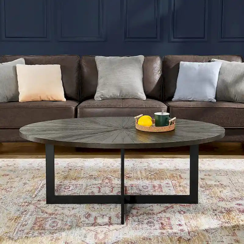 Table basse ovale en frêne avec piètement croisé en fer et étagère à 2 niveaux