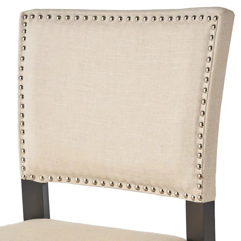 Tabouret de bar contemporain en lin avec garniture cloutée