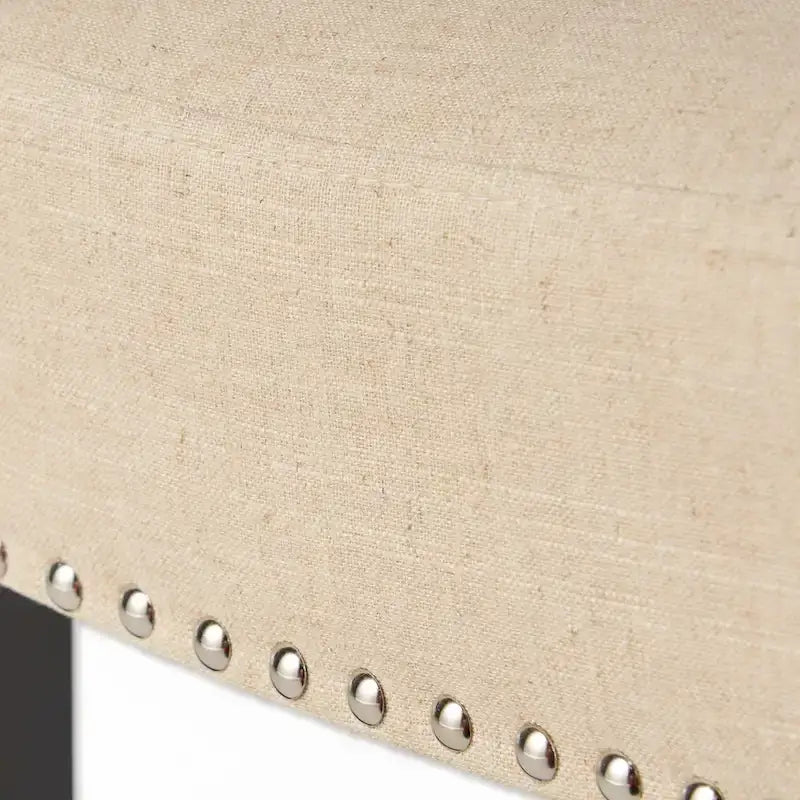 Tabouret de bar contemporain en lin avec garniture cloutée