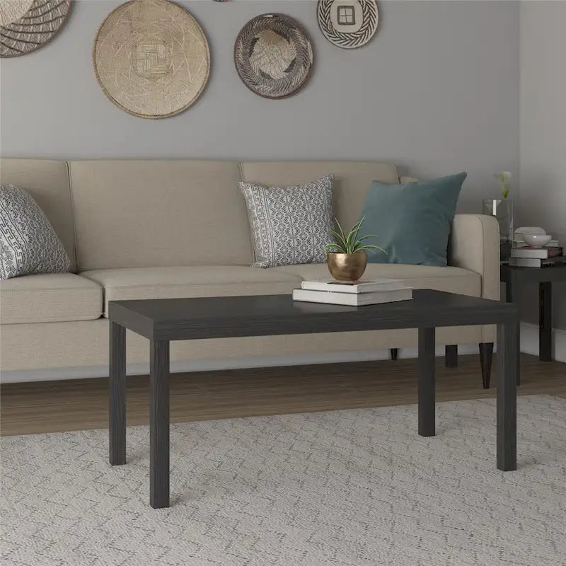 Table basse rectangulaire minimaliste avec finition grain de bois et pieds blocs